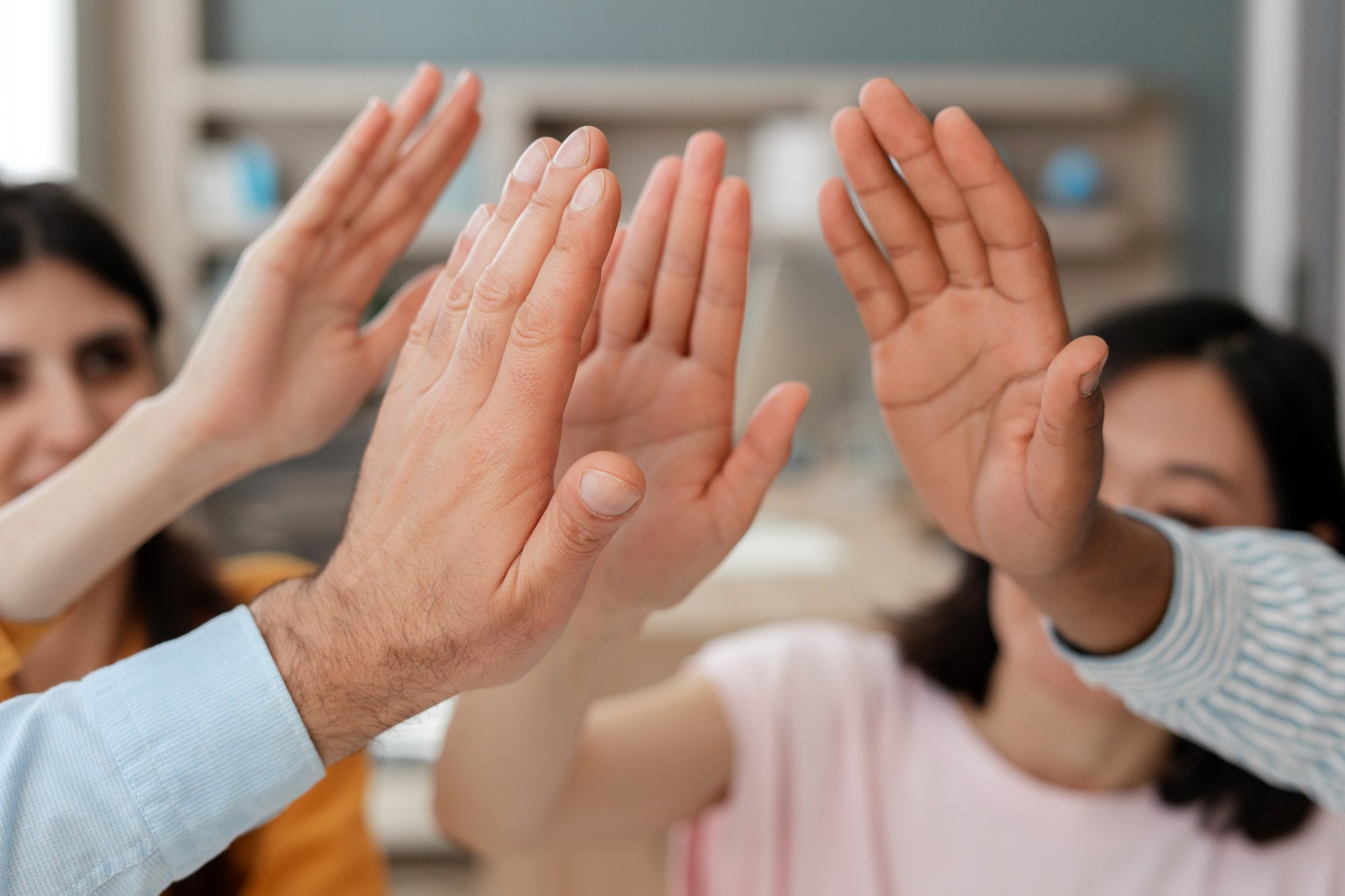 happy-business-team-giving-high-five-celebrating-s-2025-02-20-10-15-56-utc happy-business-team-giving-high-five-celebrating-s-2025-02-20-10-15-56-utc